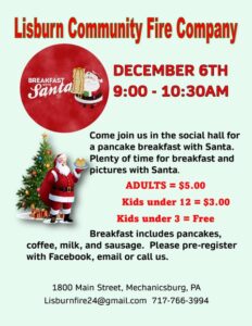 anta Claus with Christmas tree at Lisburn Fire Company Breakfast with Santa event"